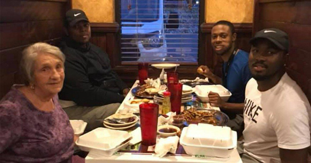 3 young men invite elderly widow to sit with them after seeing her dining alone cbsn.ws/2IEoGNt