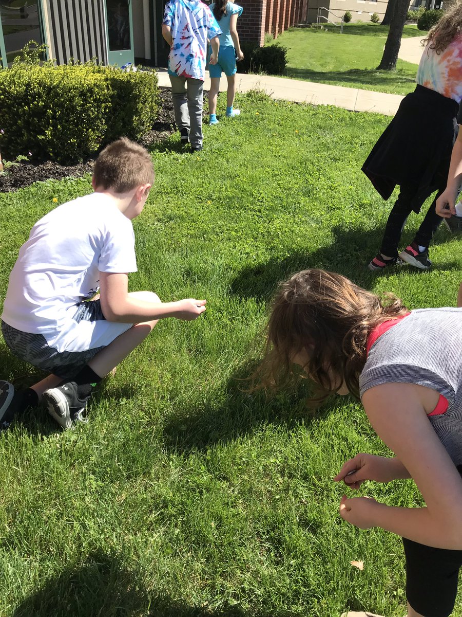 nwefirst's tweet photo. Coin Hunt in the grass for our math unit on money! #nwetigers #secondgradefun #mathfun https://t.co/gQ8YX4a649