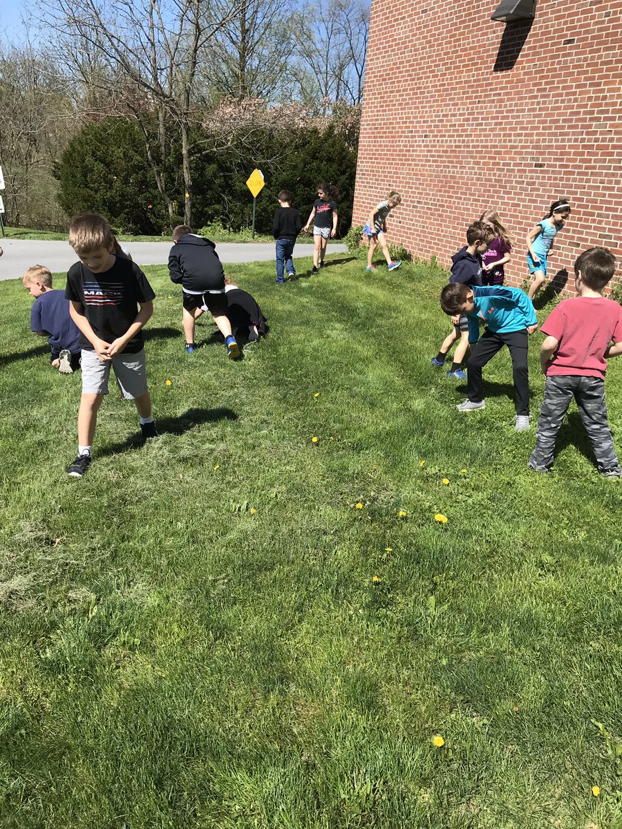 nwefirst's tweet photo. Coin Hunt in the grass for our math unit on money! #nwetigers #secondgradefun #mathfun https://t.co/gQ8YX4a649