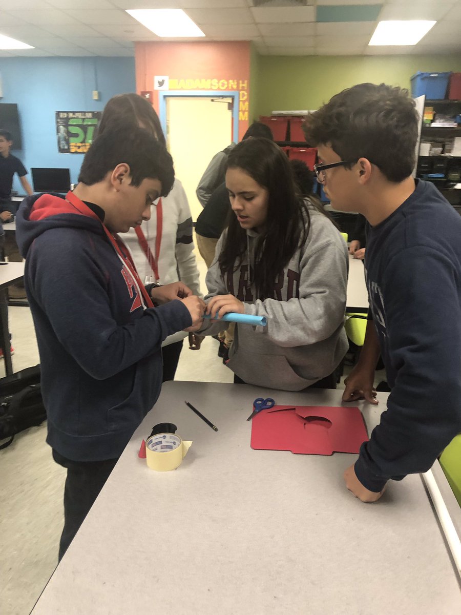 HDMcMillan's tweet image. STEM Engineering students collaborating with ASD students to build paper rockets. #STEMis #AutismAwarenessMonth @AdamsonHDMM