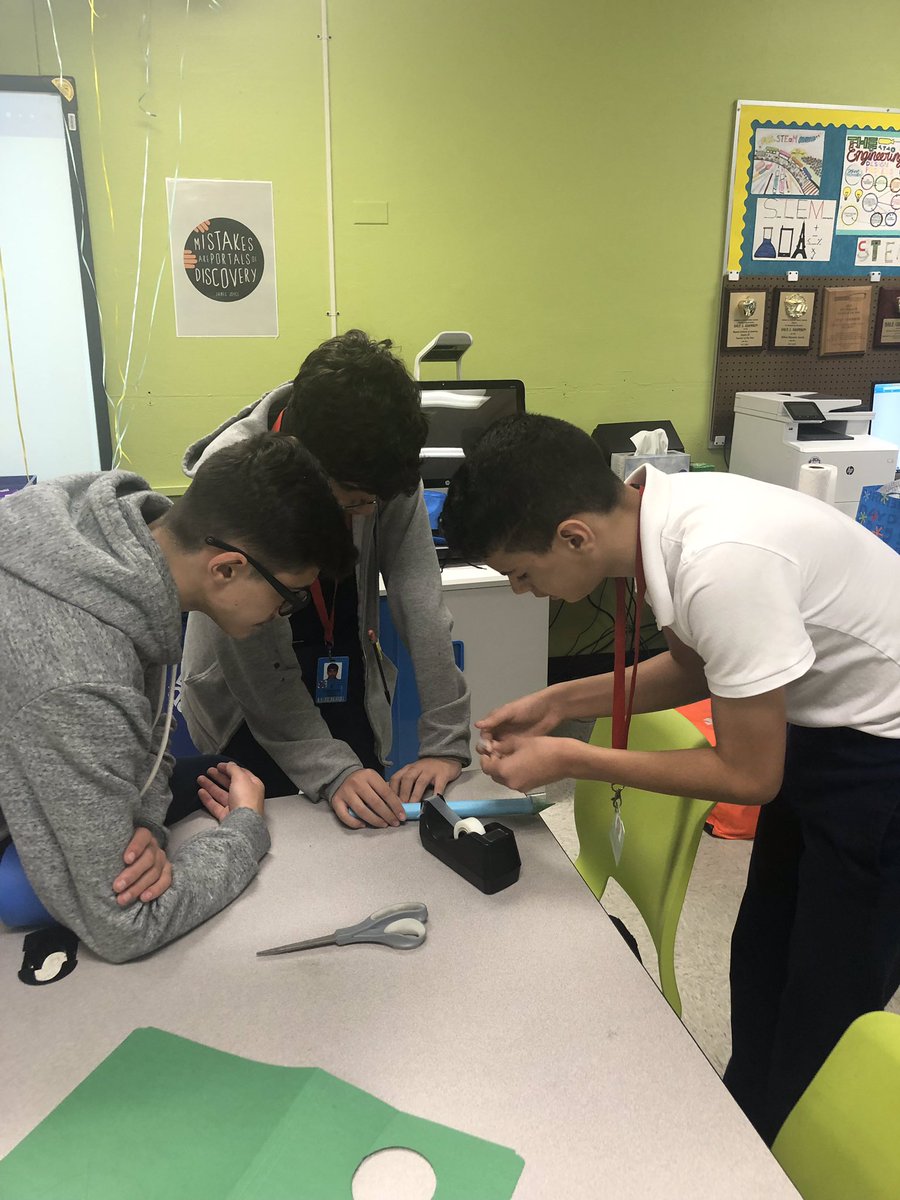 HDMcMillan's tweet image. STEM Engineering students collaborating with ASD students to build paper rockets. #STEMis #AutismAwarenessMonth @AdamsonHDMM