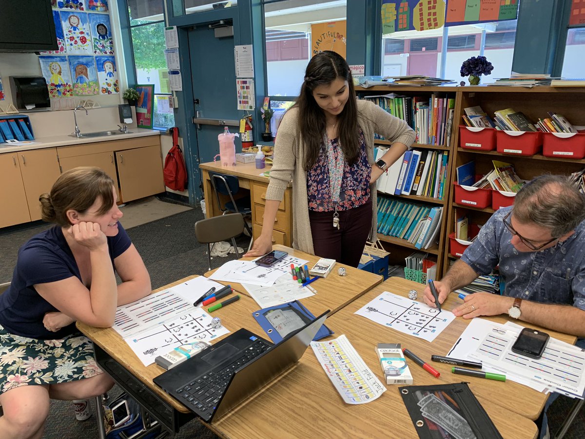 Teachers collaborating at our first site Ozobot training. @rusd_ile #rusdlearns #csforall