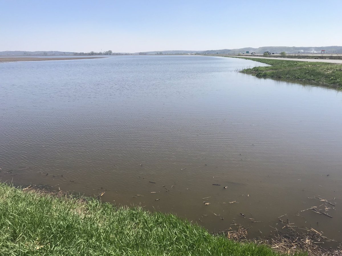 BetsyJibben's tweet photo. Crescent, IA - We saw more busted bins. A farmer took us to his ground roughly a half mile or so from Missouri River. The ground was dried down but flooded AGAIN days ago because of rising water levels from the river. Probably won’t plant there. https://t.co/rSBOCMYgLW