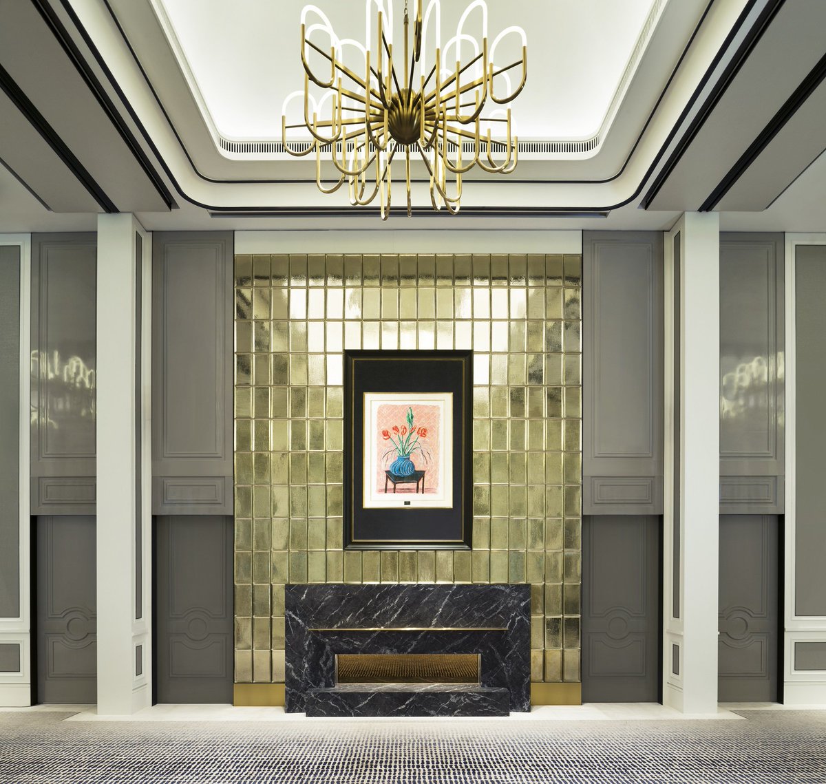 Caroline II is designed to resemble a living room, showcasing a brass-paneled feature wall, embellished with a painting by David Hockney. For tailored meeting and event packages, speak to our events specialists at events.singapore@stregis.com.
