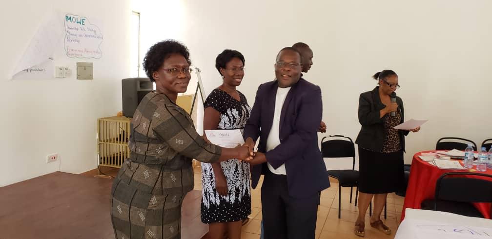 min_waterUg's tweet photo. #MWEworks: @min_waterUg Senior Management Members receiving their Certificates at the concluded #SMM Retreat and Leadership Training that took place in Mbale district. @StateHouseUg @okidi64 @DrKitutu @HonKibuule @MosesWatasa @HassyLimlim @JEyatu @Parliament_Ug @Muwonge58334027 https://t.co/MUn8mp86vG