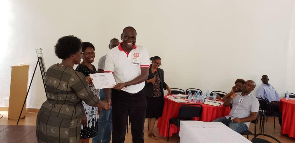 min_waterUg's tweet photo. #MWEworks: @min_waterUg Senior Management Members receiving their Certificates at the concluded #SMM Retreat and Leadership Training that took place in Mbale district. @StateHouseUg @okidi64 @DrKitutu @HonKibuule @MosesWatasa @HassyLimlim @JEyatu @Parliament_Ug @Muwonge58334027 https://t.co/MUn8mp86vG