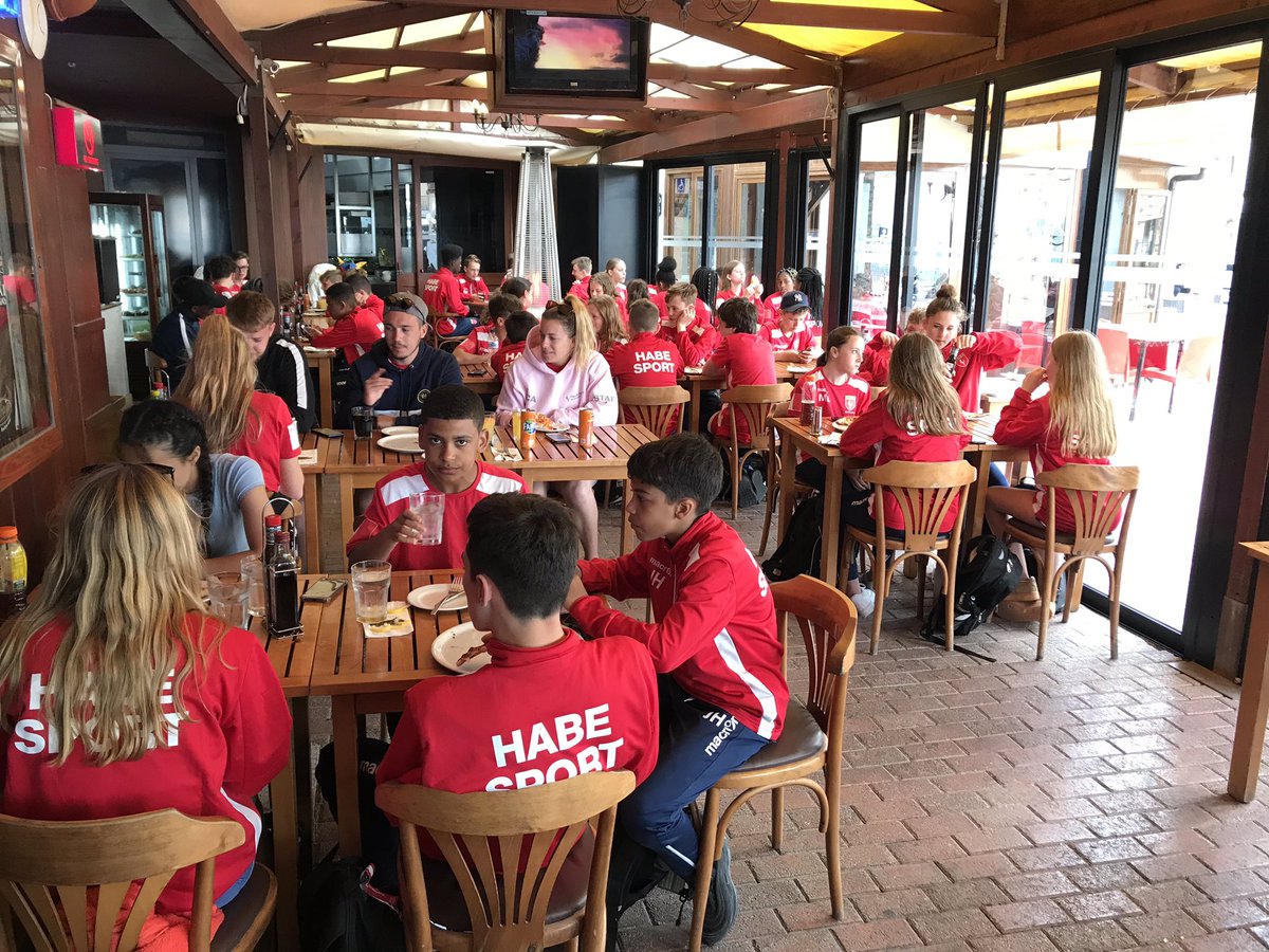 HabeSport's tweet photo. To celebrate a successful tour we decided to treat the students to a pizza lunch. #topofthetour #pizzaparty #MaltaSportsTour2019 #HABEontour @HarrisBeckenham https://t.co/lZUQRzAx0T
