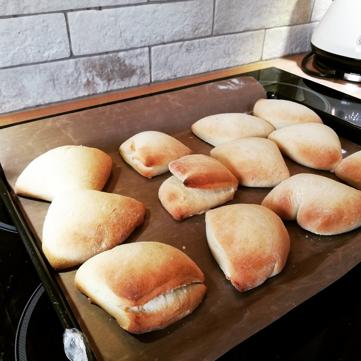 llangariad's tweet image. First attempt at a recipe from the #TogetherCookbook from #HubbCommunity Mahamri (Ugandan cardamom &amp;amp; coconut rolls) to be served later with Egyptian lamb fattah (using #WelshLamb of course!) #Unity #PeaceKitchen Really chuffed!