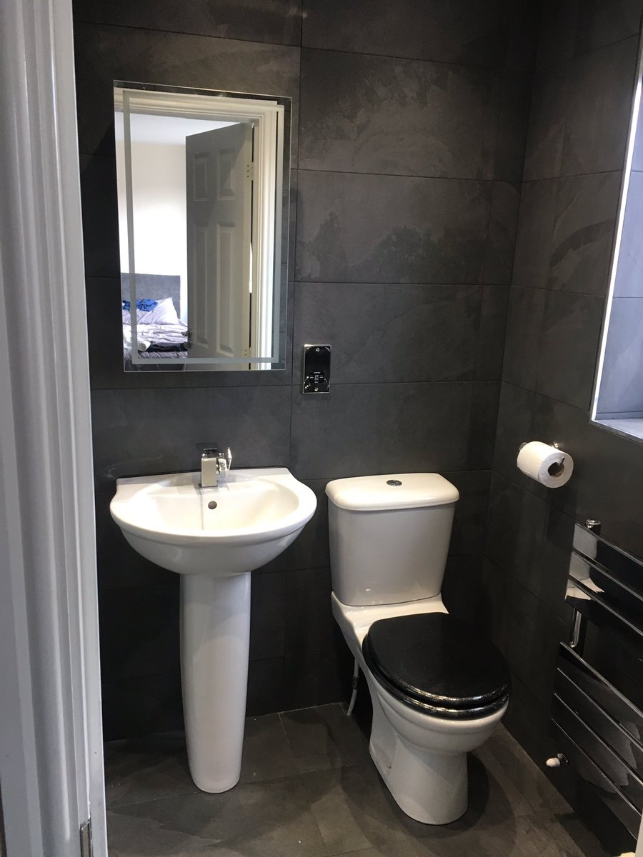 ninjabearhug's tweet photo. Finally finished my damn en-suite bathroom install! Totally stripped out, plumbing changed, new shower and light up tap, tiled all round inc floor, new electrics inc shaver socket, spotlights and led mirror, and new radiator. #HateDIY https://t.co/xqn685JYhj
