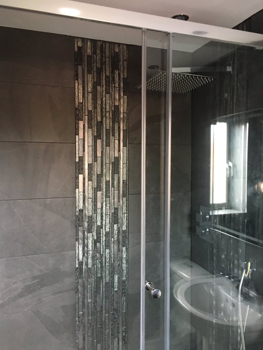 ninjabearhug's tweet photo. Finally finished my damn en-suite bathroom install! Totally stripped out, plumbing changed, new shower and light up tap, tiled all round inc floor, new electrics inc shaver socket, spotlights and led mirror, and new radiator. #HateDIY https://t.co/xqn685JYhj