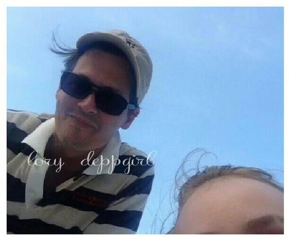 Couple of pics from August 2014 & it looks like his daughter was with him in the Bahamas. So he was detoxitating in his kids company?Yes, sure,Amber.I already believe you.Second one from Target around August 25-26,all happy.Just 1 week later when he was all manic as Heard claimed