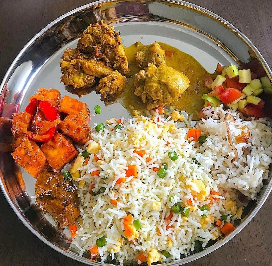 Ghee rice with Chicken varuvalRaw mango chutney 