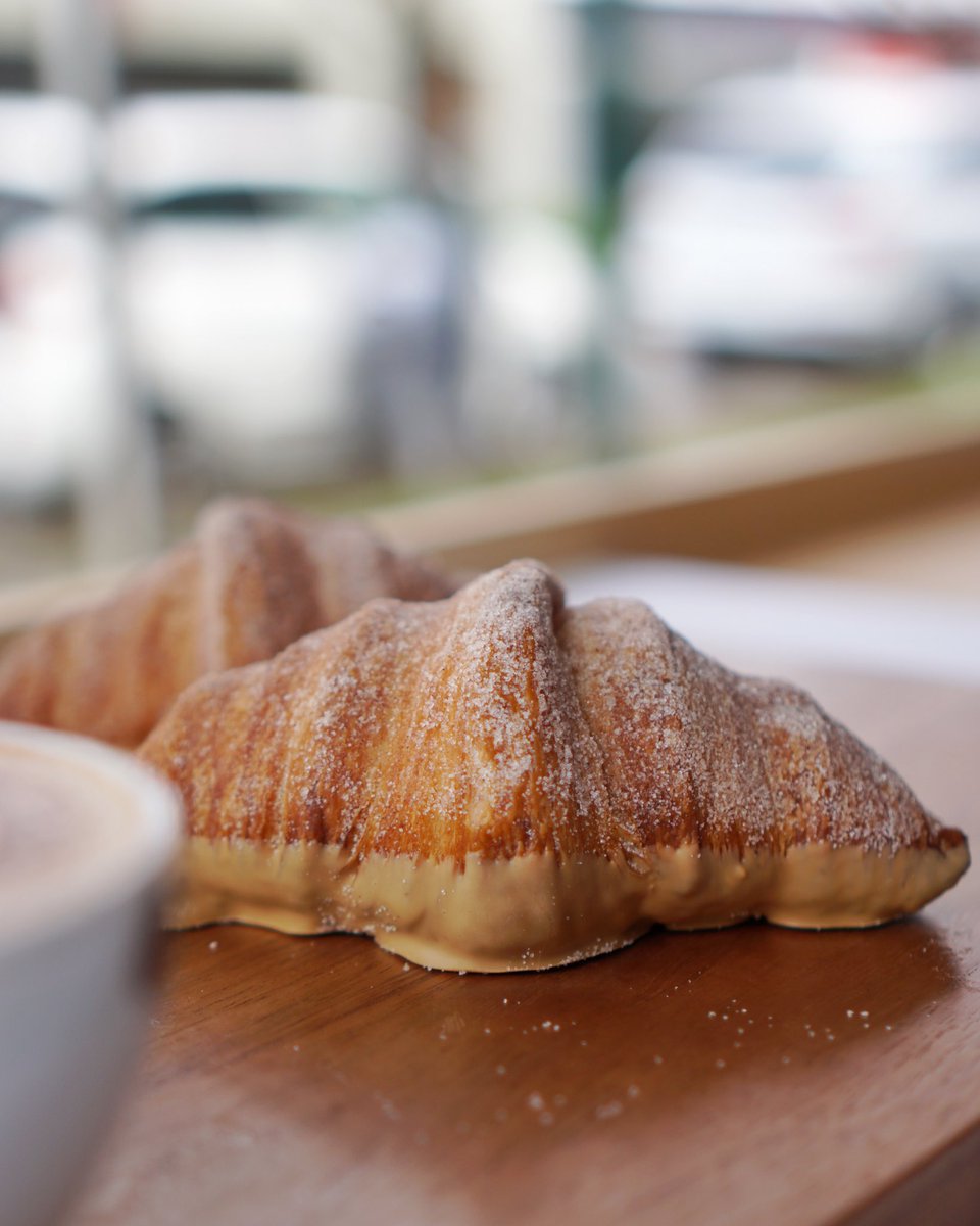 Bel_Cafe's tweet photo. Don’t worry, churro-up! New to the pastry line-up is our Churro Croissant. After tossed in cinnamon sugar, this 2-in-1 goodness is dipped in caramelized white chocolate, and then filled with cajeta cremeux. You’re gonna have a good time getting messy with this one. https://t.co/EzMrmXlyLD