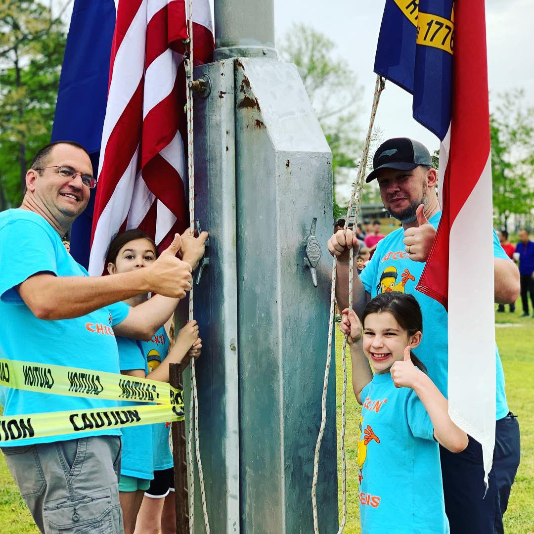 DavidBohmNC's tweet image. The Kicking Chickens tribe raising the flag at Camp Seagull. @ArapahoeNation #ForAll #HowHow