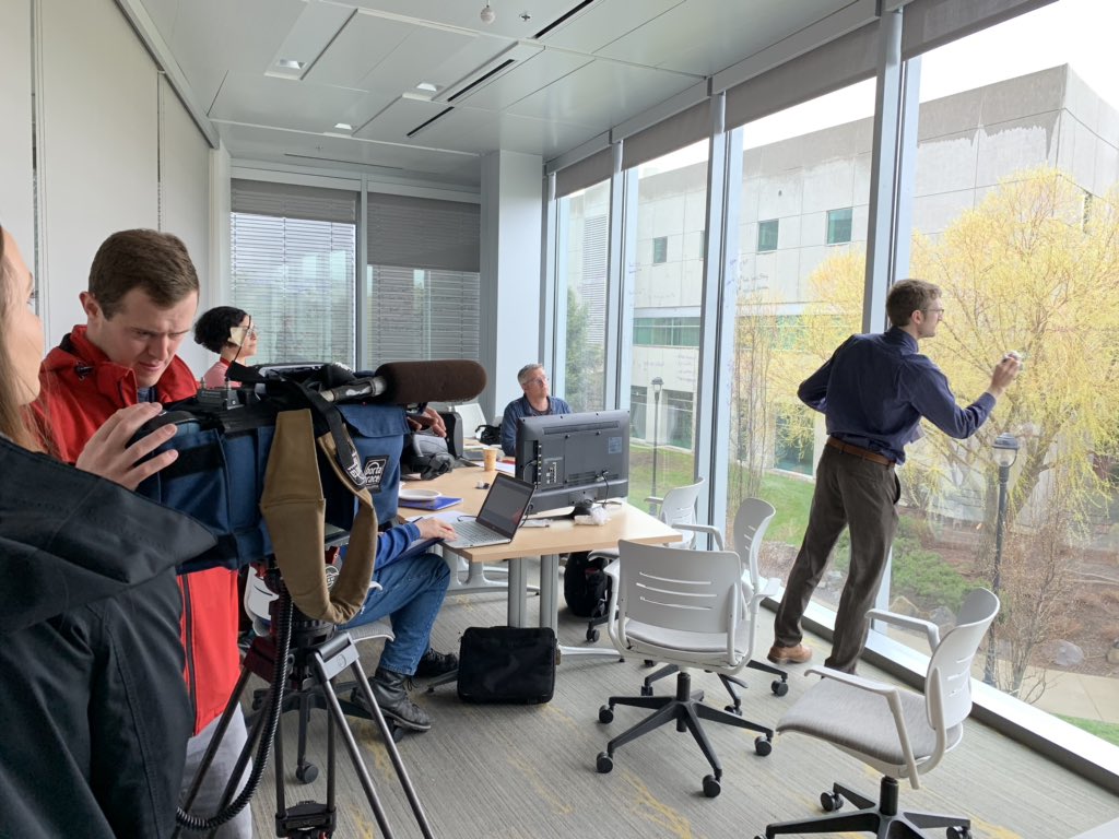 andrewintech's tweet photo. That moment when local media shows up to do a story on @WSUMedicine #WSUMedHack (also big windows are great white boards) #hcldr #pinksocks #FightBurnout #behavioralhealth https://t.co/zUs3ahWyif
