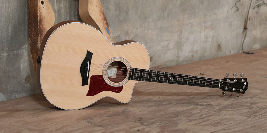 The new 214ce from <a href="/TaylorGuitars/">Taylor Guitars</a> now comes with layered koa back and sides for greater clarity. Try it out! pbxx.it/ctTWyM
