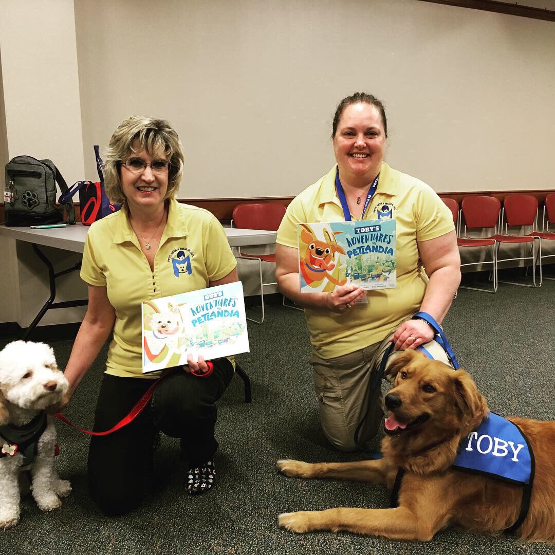 kimrich01's tweet photo. When you show up at the library and have the same book as your buddy 😍 #readdog #therapydog #libraries @PetsMission https://t.co/wch2B0uKUN