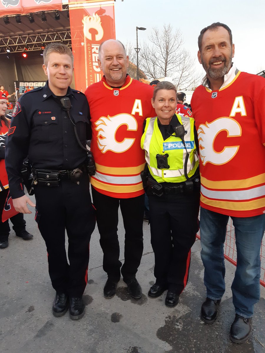 CPSSgtMartin's tweet photo. A few of my @CalgaryPolice colleagues are at the Red Lot for tonight's @NHLFlames game, they got to meet former Flames Jamie Macoun &amp; Colin Patterson. #YYC #GoFlamesGo https://t.co/lxnrqZ5GAY