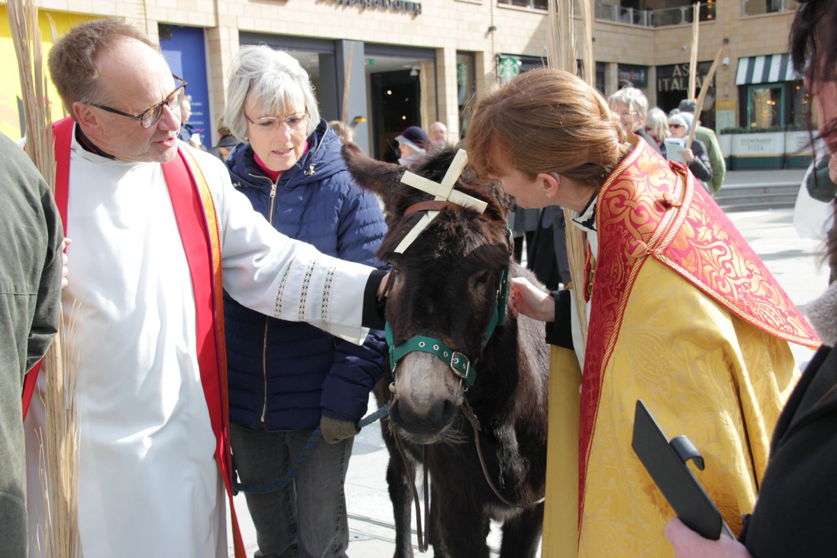 The Archdeacon of Worcester and and <a href="/WorcCathedral/">Worcester Cathedral</a> Canon Georgina Byrne offer some reassurance to Nina the donkey ahead of the Palm Sunday procession! But what were they saying?!