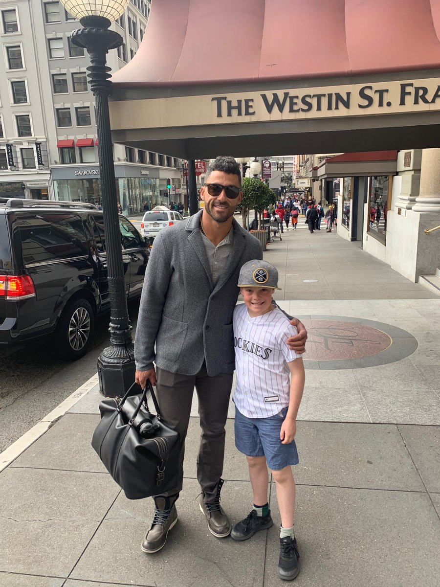 MichaelSlevin's tweet photo. Thank you Nolan Arenado and Ian Desmond for taking a minute with Sawyer. Go @rockies https://t.co/i2ZDlz9M8C