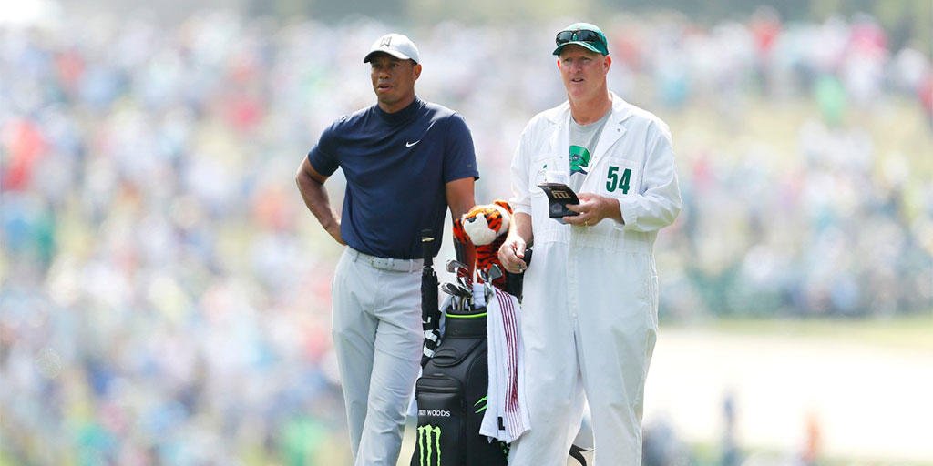 EndicottCollege's tweet photo. Tiger Woods won the #Masters. Tiger's caddie is Joe LaCava, whose daughter goes to Endicott. Joe LaCava wore an Endicott shirt on day one of the Masters. Therefore, Endicott won the Masters. That is all. 

#ThisIsEndicott #Tiger #MastersSunday https://t.co/S4jHuN8PY1
