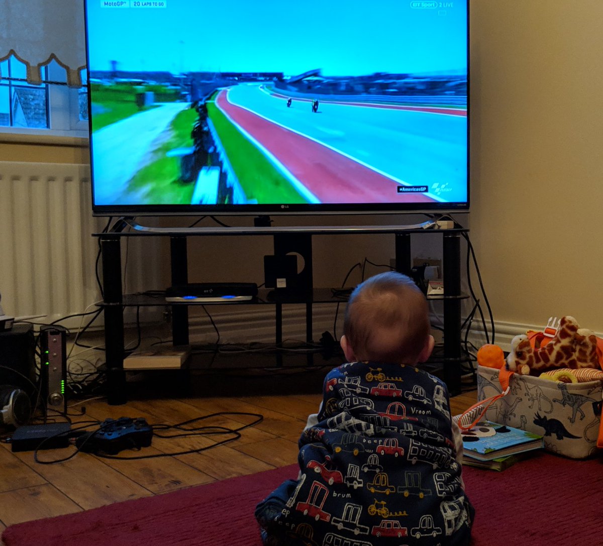 AdawayMegan's tweet photo. Parenting done right. Bedtime? What bedtime? #MotoGPconnect https://t.co/tRbc64Bh5B