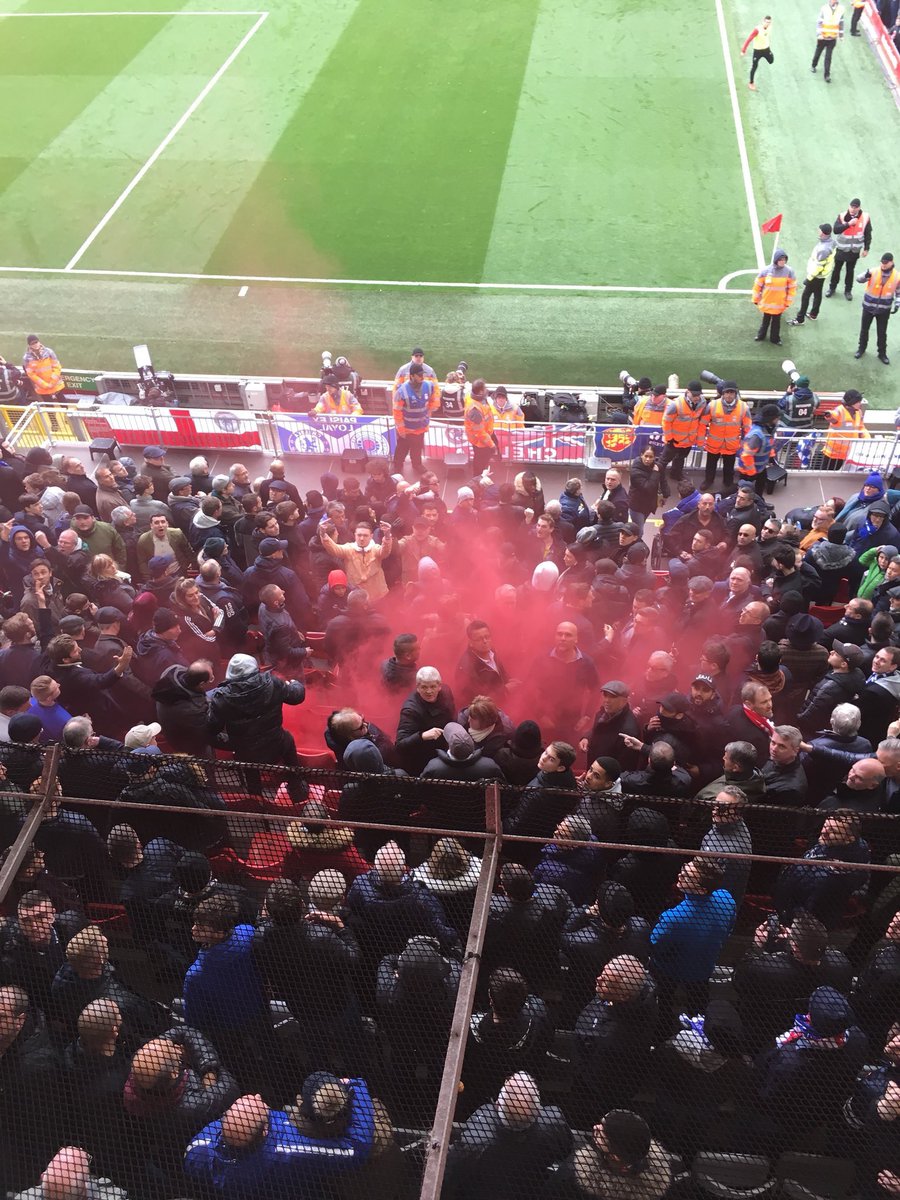 theawayfans's tweet photo. Liverpool fans threw a red smoke bomb into the Chelsea end at Anfield today... pretty much a day to forget all round for Chelsea fans... 😩 (@DPSD37) https://t.co/3ty9TgqRyV