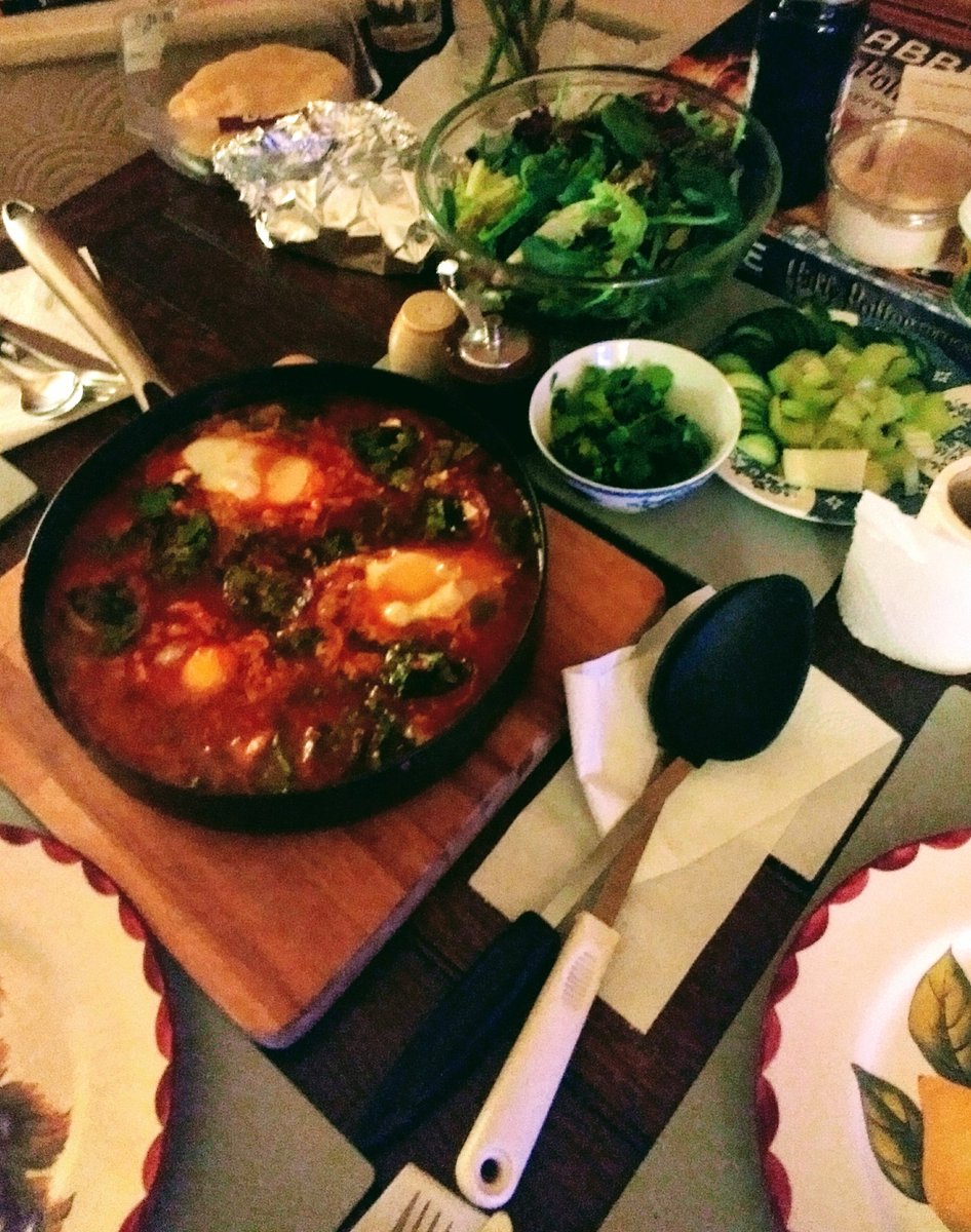 Rae_Seral's tweet photo. Tonight's shakshuka, topped with thickly sliced vine tomatoes and goats cheese. We are now so full that we might fall asleep where we sit. Yum. #absolutelystuffed #SundayFunday https://t.co/MGEOR85Zak