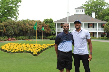 Me and my son at the Masters. What a Great Day. Go Tiger!