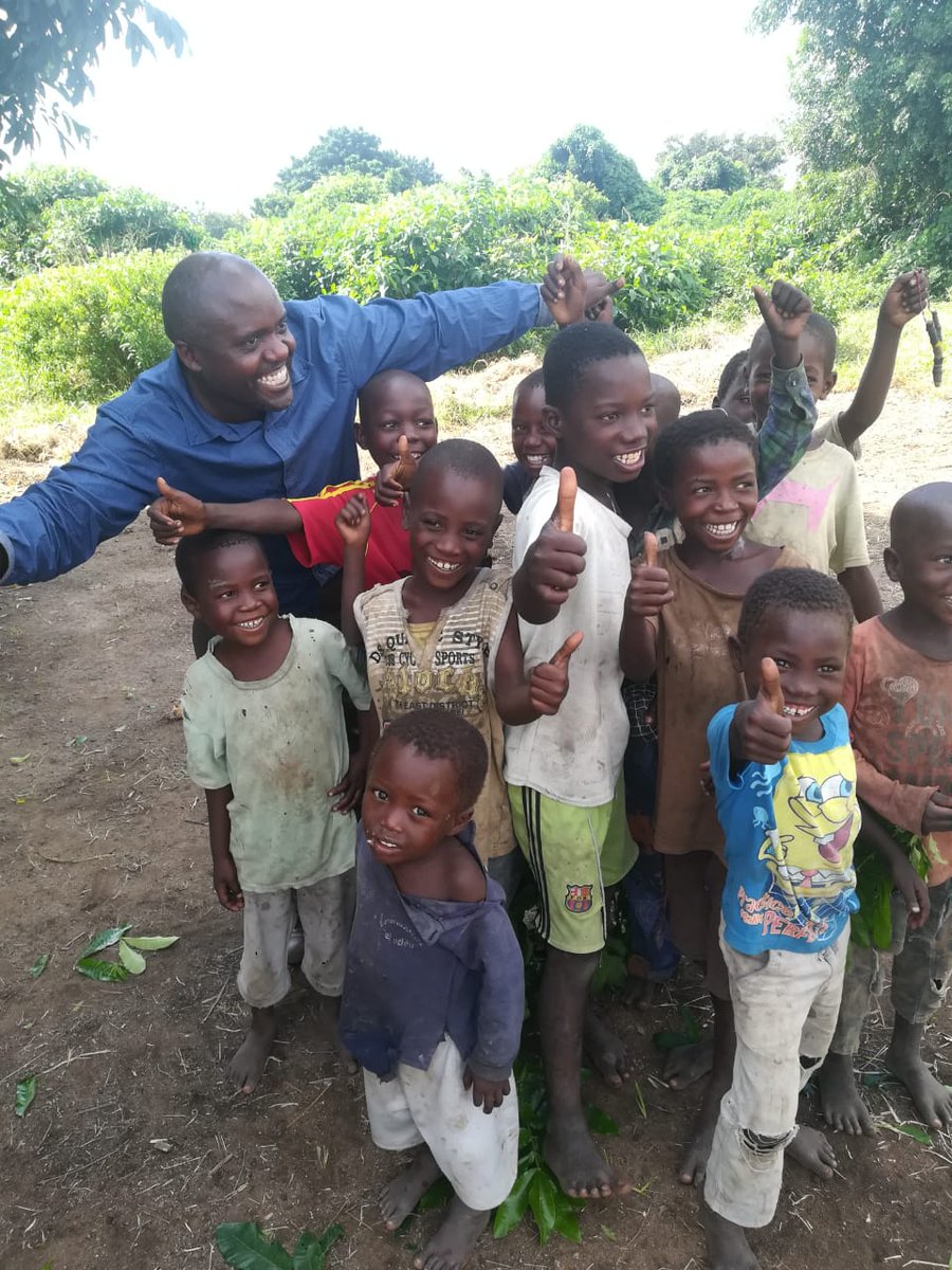 Angmissions's tweet photo. Archbishop Thabo visiting the Diocese in Niassa over the weekend. On behalf of Anglican Missions Mozambique appeal, he talked with villagers and distributed seeds to those in need after #CycloneIdai. More here: https://t.co/VDFBWQv6h6 https://t.co/LcR7c5KMdT