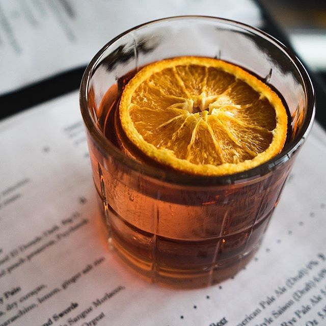 A fun slightly spicy and smoky cocktail with @delmagueymezcal , @elvelotequila , @cocchispritz rossa, @luxardoofficial sangue morlacco, fire bitters and a candied orange. “I am the Brute Squad”