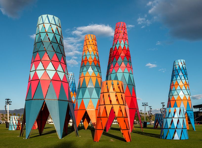 designboom's tweet photo. francis kéré's @coachella installation comprises 12 colorful towers @fuergando https://t.co/WNAFVpc3zK https://t.co/GzJB7LprV2