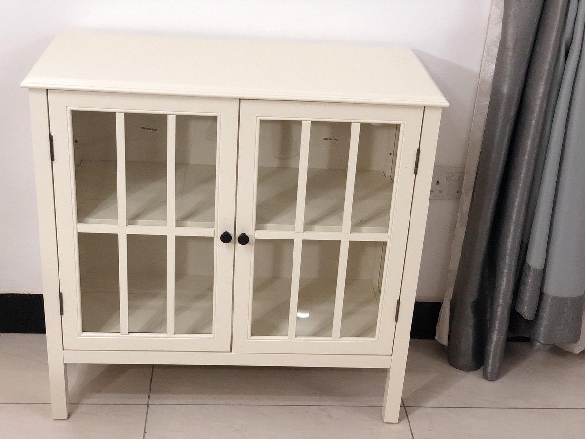tashashome's tweet photo. Spice up your home with this beautiful Windham 2-Door Accent cabinet. Shell finish, adjustable shelf with solid wood legs and antique bronze finish hardware. 
(78.7cm x 80.4 x 35) Available now #TashasHome #Cabinets https://t.co/oVlCFbix7v