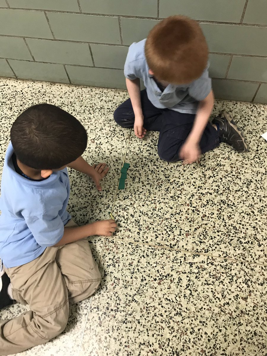 IAMKinderCrew's tweet photo. Measuring the squares in the hallway. #kindergarten #KinderCrew #InspireMuncie https://t.co/Wlx3rtVutl