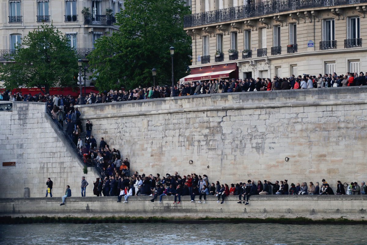 euronews's tweet photo. Paris stands still as firefighters have still not managed to put out the fire that has ravaged our beloved Cathedral
#NotreDame 

https://t.co/xsmxG700sk https://t.co/22SsRshzD5