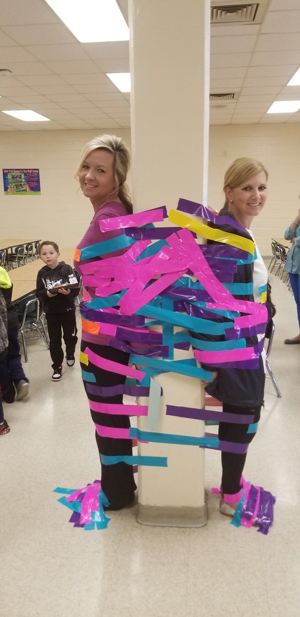 NicoleHooker17's tweet photo. Duct taping the principals in support of the Autism Society of Surry County!! #theBHT @MACSchools https://t.co/ydaBpFMl8V