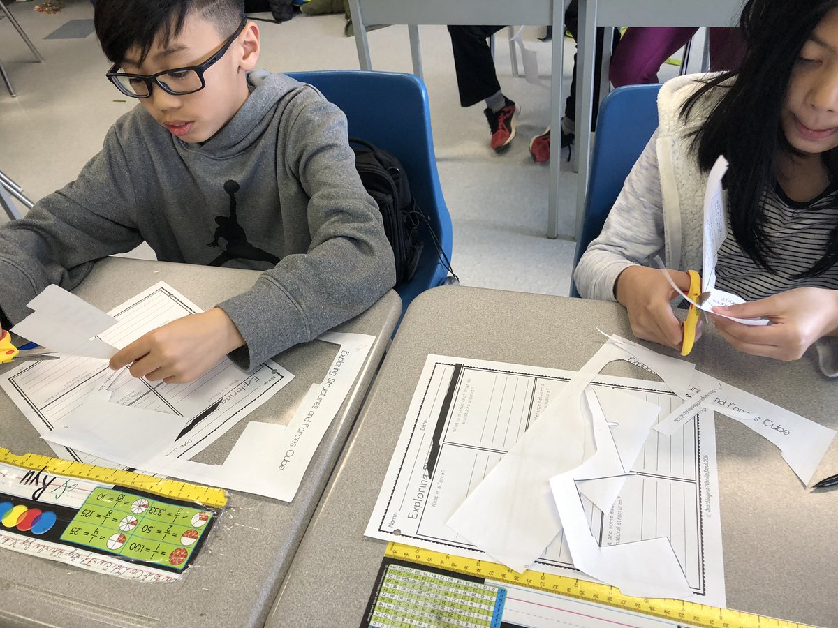 MrsCillis's tweet photo. The grade 5s started their structures unit! To assess prior knowledge we are using nets of cubes, building them and rolling the die with a partner and answering the questions found on the face of the side we roll #mathandscienceinone #structuresunit https://t.co/PQkSt8eqlB