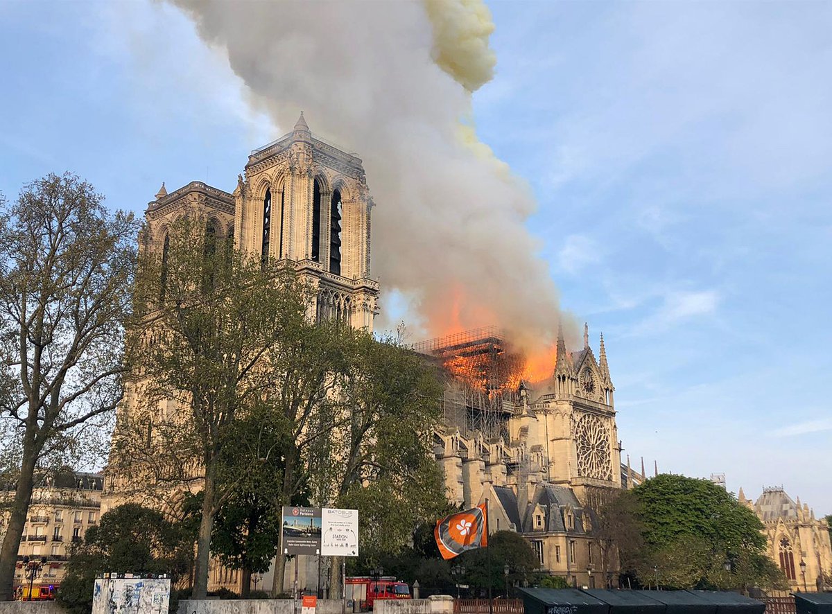 #BREAKING: A fire has broken out at the world-famous Notre Dame cathedral in Paris. Flames are shooting through the roof. #NotreDame (Photo: <a href="/AP/">The Associated Press</a>) on.wtsp.com/2GmNKpz