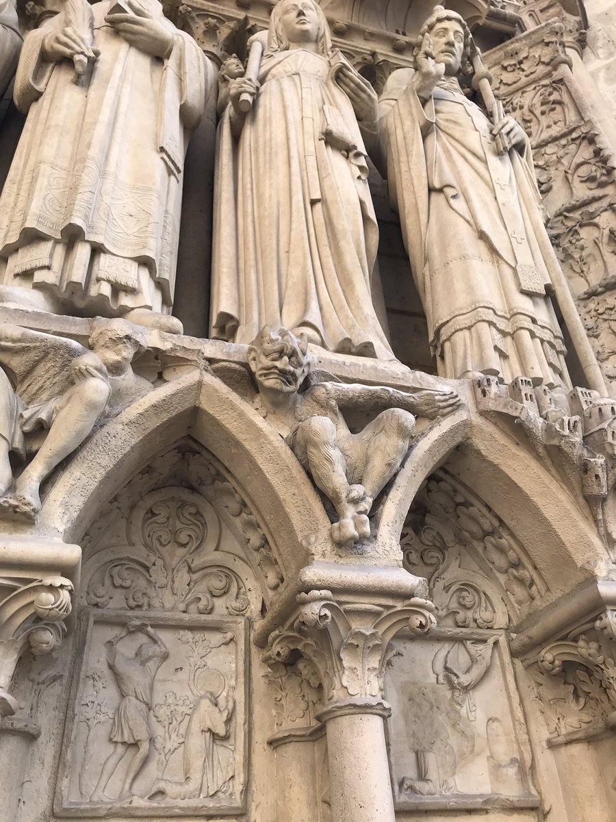helloimrachel's tweet photo. These faces on the façade of Notre Dame perfectly encapsulate how I feel about it burning. Pics taken on my trip to Paris just last year. https://t.co/aO3Gbjfwnk