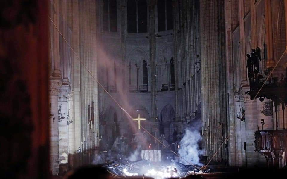 ScottBaio's tweet photo. God Bless #NotreDame. The CROSS is STILL standing tall. https://t.co/74cvJFQd98