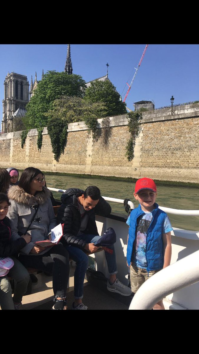 Mon fils devant Notre Dame la semaine derniere.  Mes pensees sont avec Paris et la France #NotreDame
