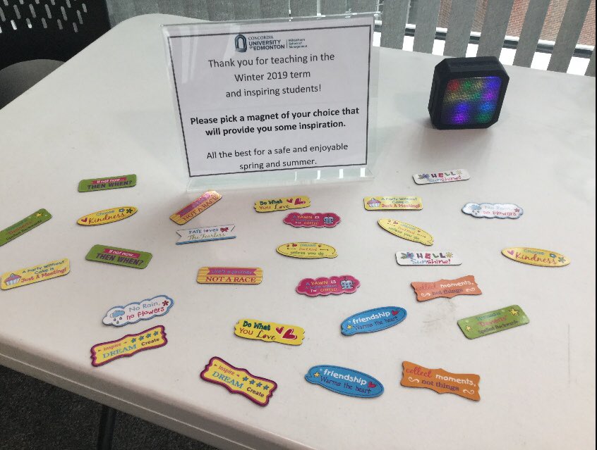 CUE_Management's tweet photo. The Faculty of Management @CUE_Management teaching team celebrated the end of term with a get together. #FunMagnets We also celebrated Tim Slaughter’s move back to the UK - it has been a pleasure to have him as an instructor @CUEdmonton Hopefully the CUE umbrella is well used! https://t.co/aKl5hdOgwG