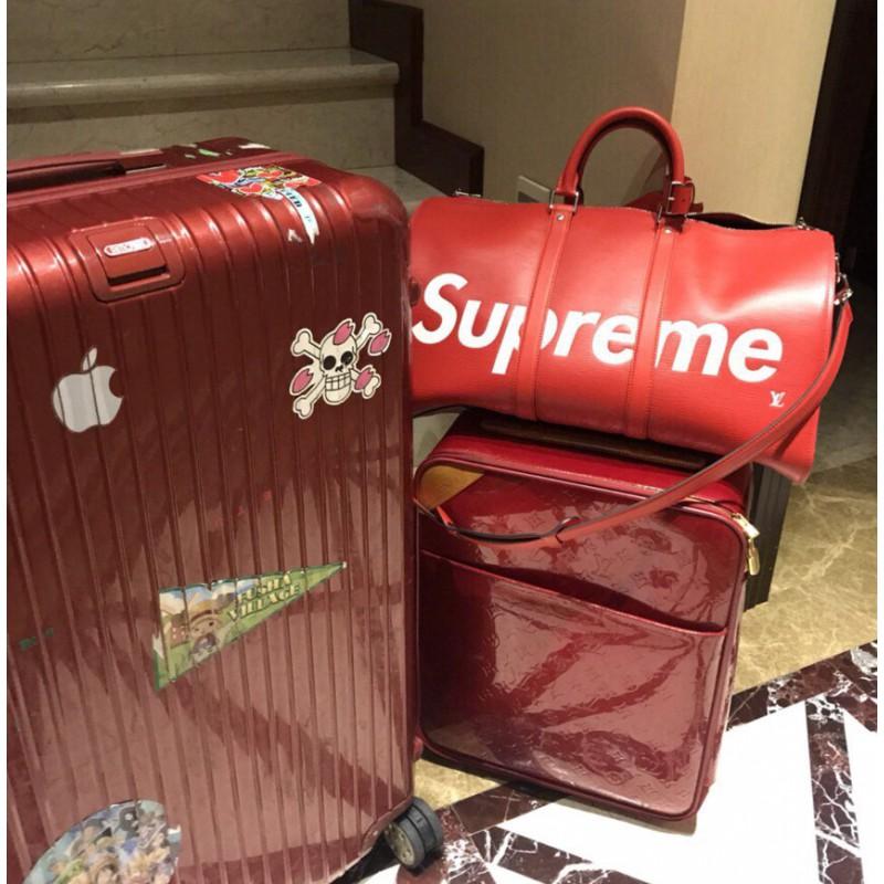 supreme suitcase fake