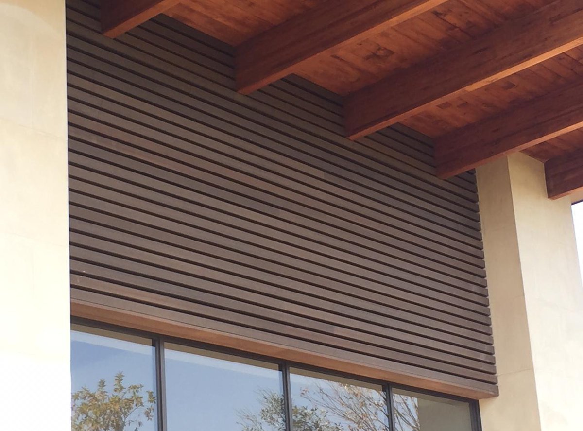 NewTechWood's tweet photo. A wonderful #installation in #Johannesburg, #SouthAfrica utilizing #NewTechWood #UH17 #SpanishWalnut #screen and #partition #boards to enhance a magnificent home https://t.co/Rnd8mAliAD