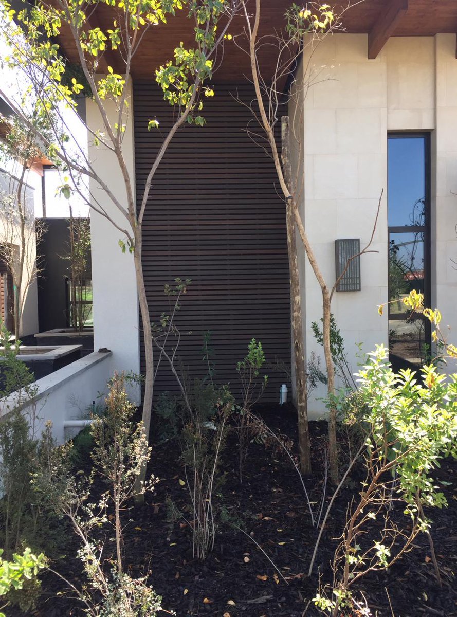 NewTechWood's tweet photo. A wonderful #installation in #Johannesburg, #SouthAfrica utilizing #NewTechWood #UH17 #SpanishWalnut #screen and #partition #boards to enhance a magnificent home https://t.co/Rnd8mAliAD