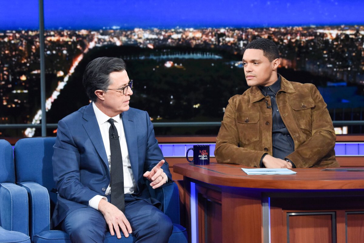 Trevornoah's tweet photo. Find someone that looks at you the way I look at Stephen! Tune into @colbertlateshow tonight to find out if we even exchange words. 👀 #FlippedInterview https://t.co/ppPI4sU4Eb