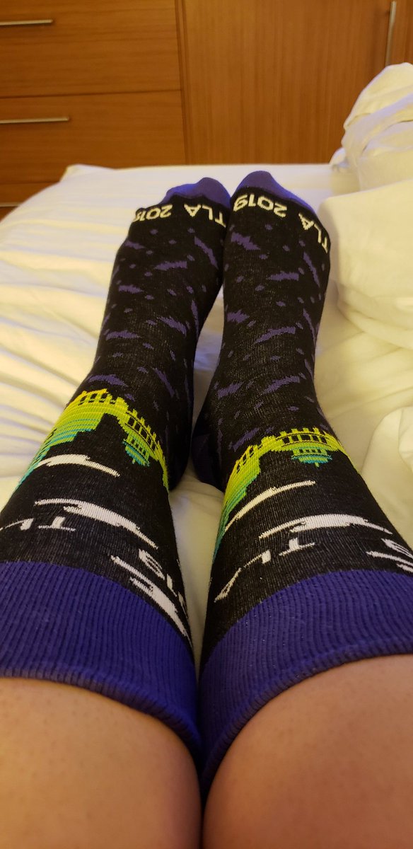 AmyGeeLibrarian's tweet photo. You know your conference is legit when it has its own socks. #txla19 #batsocks https://t.co/bijpE1DRbH