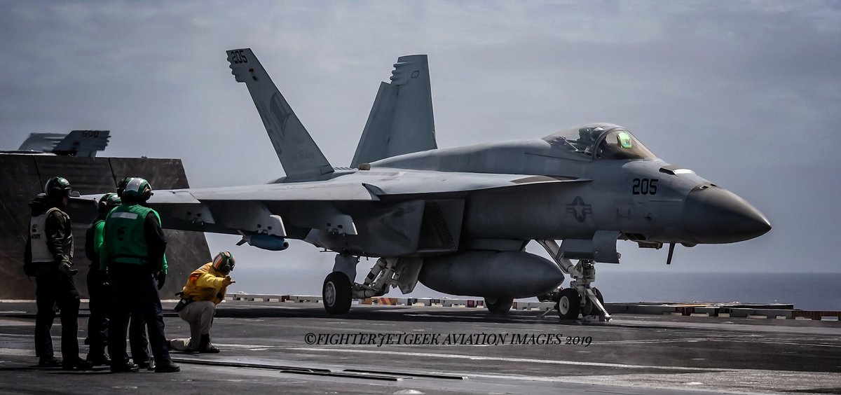 'Camelot 205', captured getting the 'launch' signal from the yellowshirted 'Shooter' for CAT-4 aboard #CVN74. What follows is the mind-bending/eye watering acceleration from zero to over 120mph....in less than 2 seconds. #VFA14 #FlyNavy #NavAir  #NavalAviation #FighterJetGeek