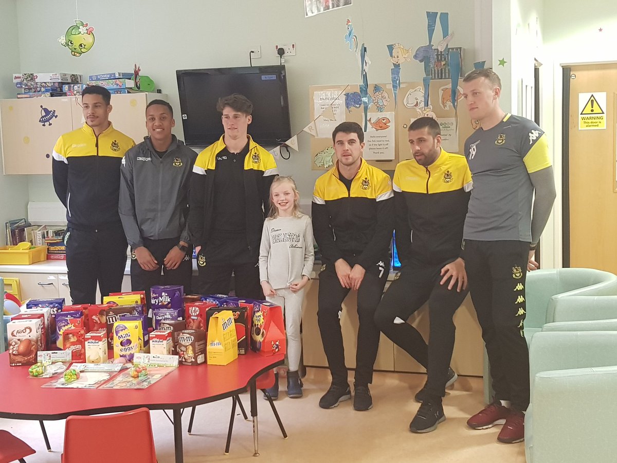 childrensODGH's tweet photo. Lovely to see some of our friends from Southport FC today. Thankyou for coming straight from training and for your fabulous egg donation. Some pictures of our staff and patients   @southport_fc @SONHStrust  #Easter https://t.co/TbTPMUxguZ