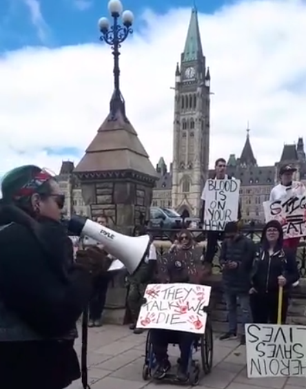 GregEqEd's tweet photo. Livestream video from Ottawa action at Parliament Hill for National Day of Action on the Overdose Crisis https://t.co/UJGxwTfG0e via @odpreventionott #ottnews #cdnhealth #OverdoseCrisis @DUALOttawa @CSCSOttawa https://t.co/ms9bNC3h9V